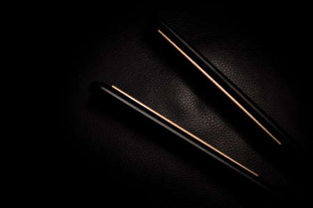 Equipment for hair stylist on black background . High quality photoの写真素材
