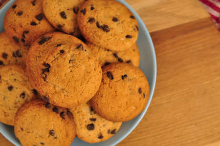 sweet crunchy cookies with dark chocolate for teatime copy spaceの写真素材