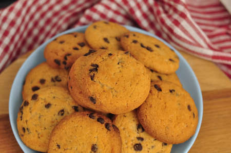 sweet crunchy cookies with dark chocolate for teatime copy spaceの写真素材