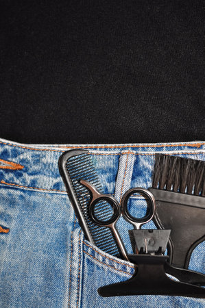 Hair stylist equipment in jeans pocket, beauty occupation . High quality photoの写真素材