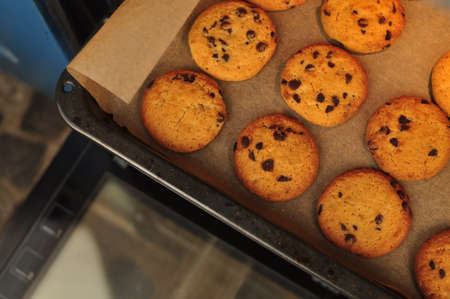 sweet crunchy cookies with dark chocolate for teatime copy spaceの写真素材
