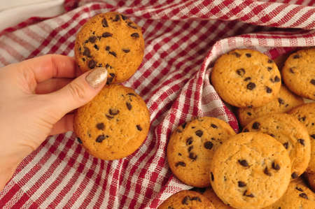 sweet crunchy cookies with dark chocolate for teatime copy spaceの写真素材