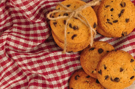 sweet crunchy cookies with dark chocolate for teatime copy spaceの写真素材