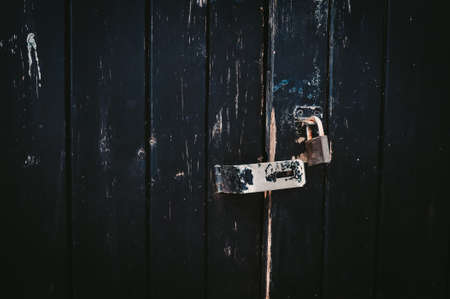 Lock on the old vintage wooden door copy space. High quality photoの写真素材