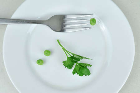 Pink tape measure and green vegetables diet concept . High quality photoの写真素材