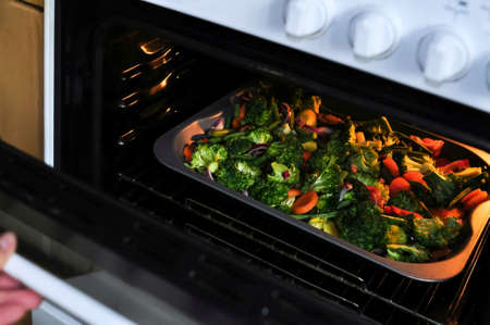 Fried vegetables broccoli pepper and bean in the oven, healthy eating . High quality photoの写真素材