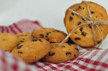 sweet crunchy cookies with dark chocolate for teatime copy spaceの写真素材