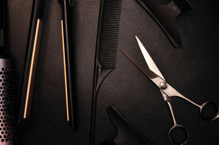 Equipment for hair stylist on black background . High quality photoの写真素材