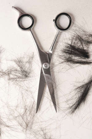 Combing hair with hairbrush macro view copy space . High quality photoの写真素材