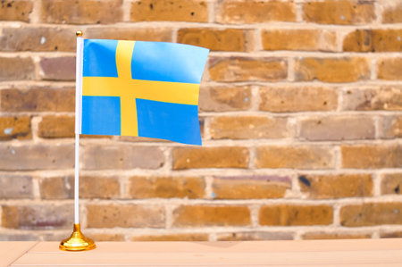 close up of National flag of Sweden yellow and blue colors.の写真素材