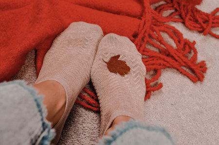 Close up of brown cotton socks autumn cozy clothing.の写真素材