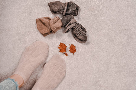 Close up of brown cotton socks autumn cozy clothing.