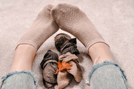 Close up of brown cotton socks autumn cozy clothing.の写真素材