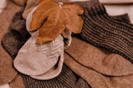 Close up of brown cotton socks autumn cozy clothing.の写真素材