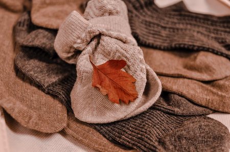 Close up of brown cotton socks autumn cozy clothing.の写真素材