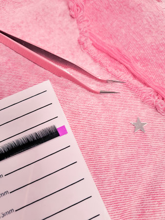 Mink lashes for eyelash extensions on pink background,beauty equipment . High quality photoの写真素材