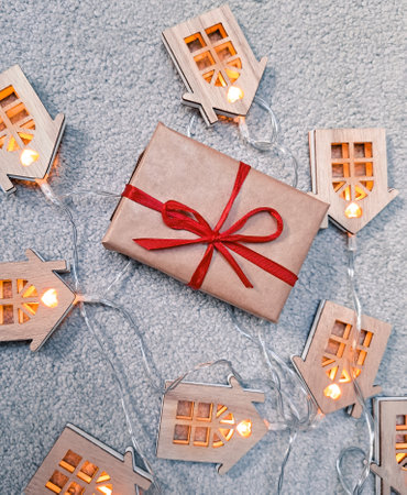 Gift box with red stripes for Christmas ,new year presents .の写真素材