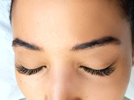 Close up of eyelash Extensions in beauty salon macro eye. High quality photoの写真素材