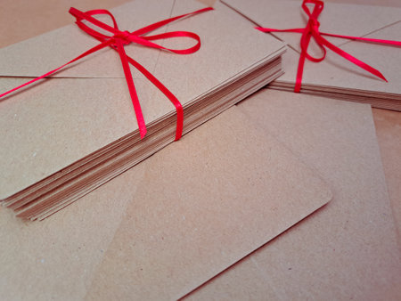 craft envelopes with the red stripe,letters to santa.の写真素材