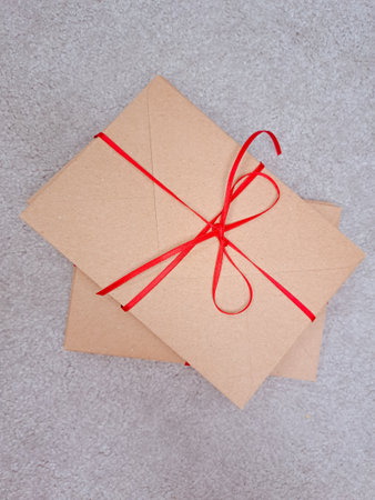 craft envelopes with the red stripe,letters to santa.の写真素材