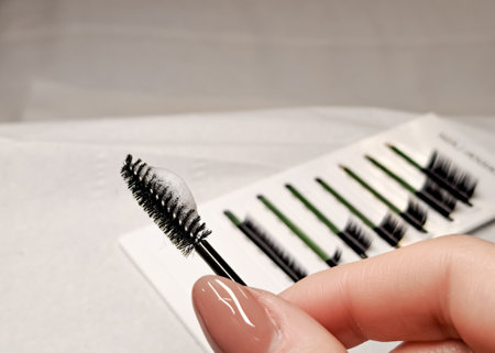 Black brush for eyelashes with lash shampoo foam ,cleaning lashes concept. High quality photoの写真素材