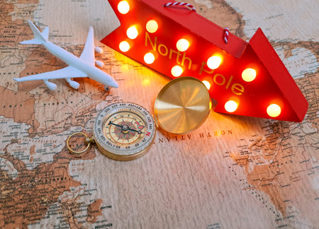 close up of golden compass white airplane on the map. High quality photoの写真素材