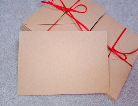 craft envelopes with the red stripe,letters to santa.の写真素材