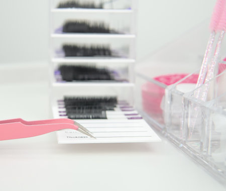 beauty salon equipment for eyelash extensions ,tools or lash technician white and pink colors.の写真素材