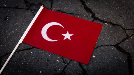 National flag of Turkey on the cracked ground,earthquake concept 2023 tragedy . High quality photoの写真素材