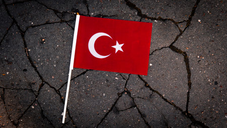 National flag of Turkey on the cracked ground,earthquake concept 2023 tragedy . High quality photoの写真素材