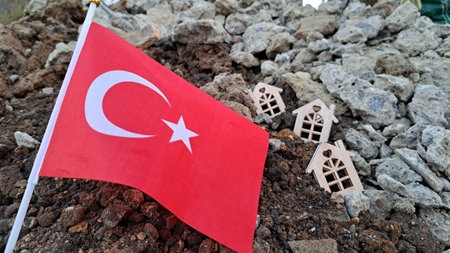 National flag of Turkey on the cracked ground,earthquake concept 2023 tragedy . High quality photoの写真素材