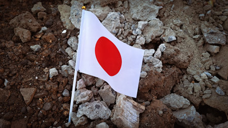 National flag of Japan on the cracked ground,earthquake concept 2023 tragedy . High quality photoの写真素材
