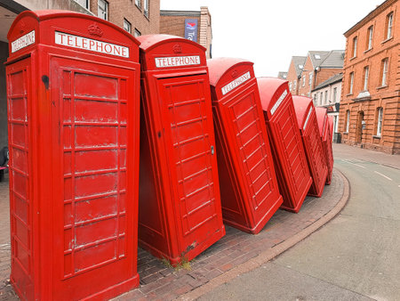 Line of red call boxes on the street of London UK. High quality photoの写真素材