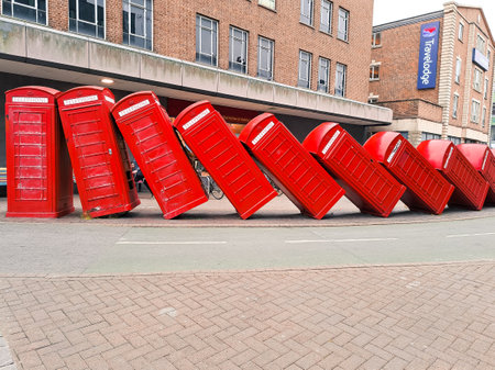Line of red call boxes on the street of London UK. High quality photoの写真素材