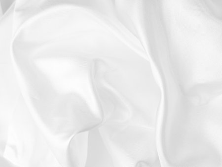 white silk fabrik background with copy space for inscription,satin backdrop and wallpaper.の写真素材