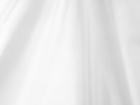 white silk fabrik background with copy space for inscription,satin backdrop and wallpaper.の写真素材
