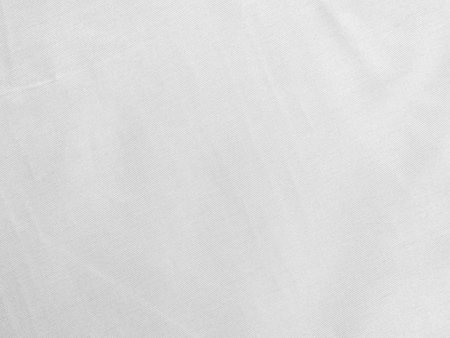 white silk fabrik background with copy space for inscription,satin backdrop and wallpaper.の写真素材