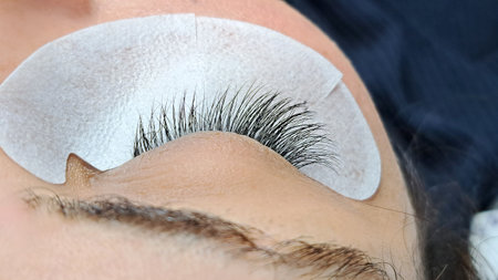 close up of eye with eyelash extension macro view,beauty salon treatment.の写真素材