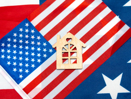United states of America national flag.red white and blue stripes and stars and map and wooden house,usa home conceptの写真素材
