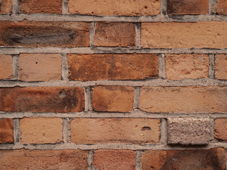 Brown textured brick wallpaper and background copy space. High quality photoの写真素材