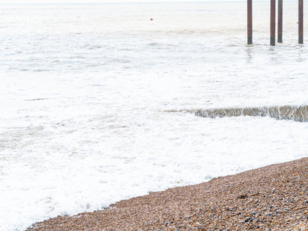 blue sea with waves and sandy shore ,beautiful natural seascape,wallpaper and background copy spaceの写真素材