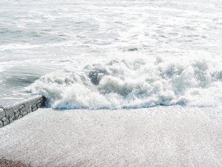 blue sea with waves and sandy shore ,beautiful natural seascape,wallpaper and background copy spaceの写真素材