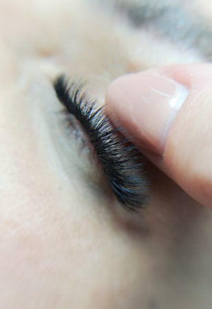 close up of eye with eyelash extensions ,beauty salon treatment. High quality photoの写真素材