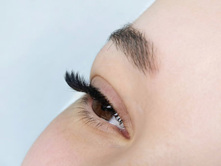 close up of eye with eyelash extensions ,beauty salon treatment. High quality photoの写真素材