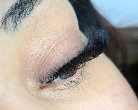 close up of eye with eyelash extensions ,beauty salon treatment. High quality photoの写真素材
