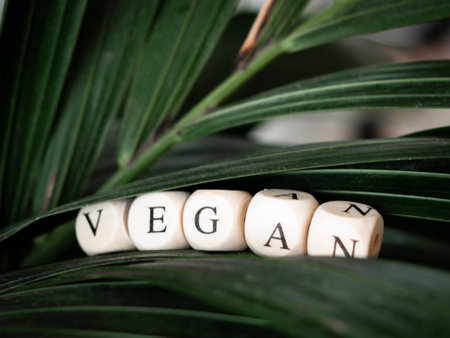 close up of inscription vegan in green leaves ,healthy eating concept. High quality photoの写真素材