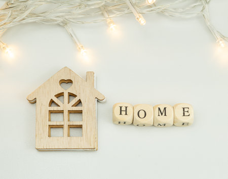wooden beads with inscription home,home concept.の写真素材