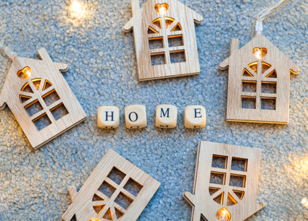 wooden beads with inscription home,home concept.の写真素材