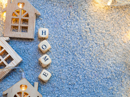 wooden beads with inscription home,home concept.の写真素材