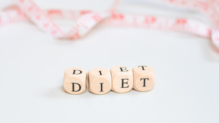 inscription diet on red measure background ,healthy eating concept. High quality photoの写真素材